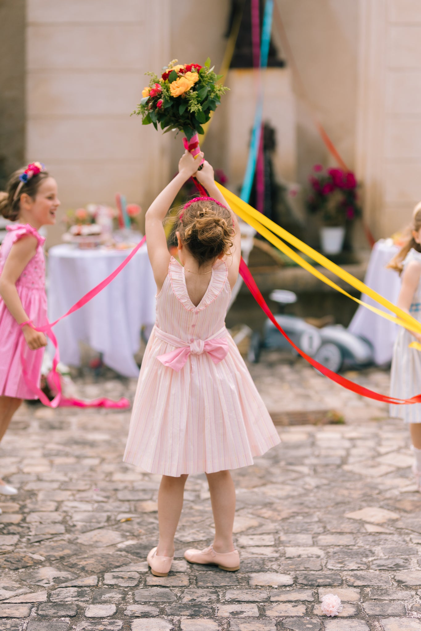 Capucine Pink Yellow Stripe Sleeveless Smocked Dress